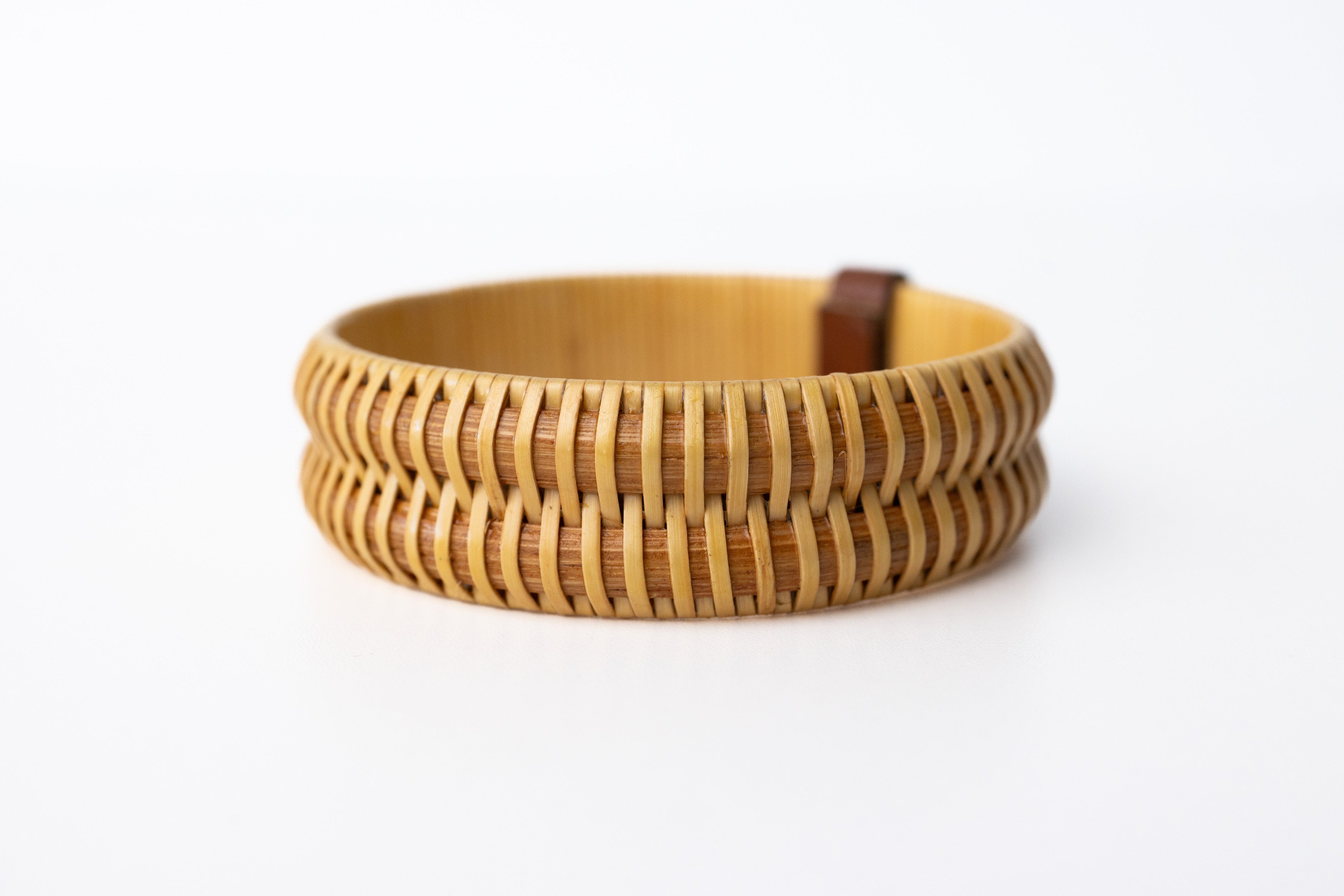 A closer look at the handcrafted double stave wooden bracelet.