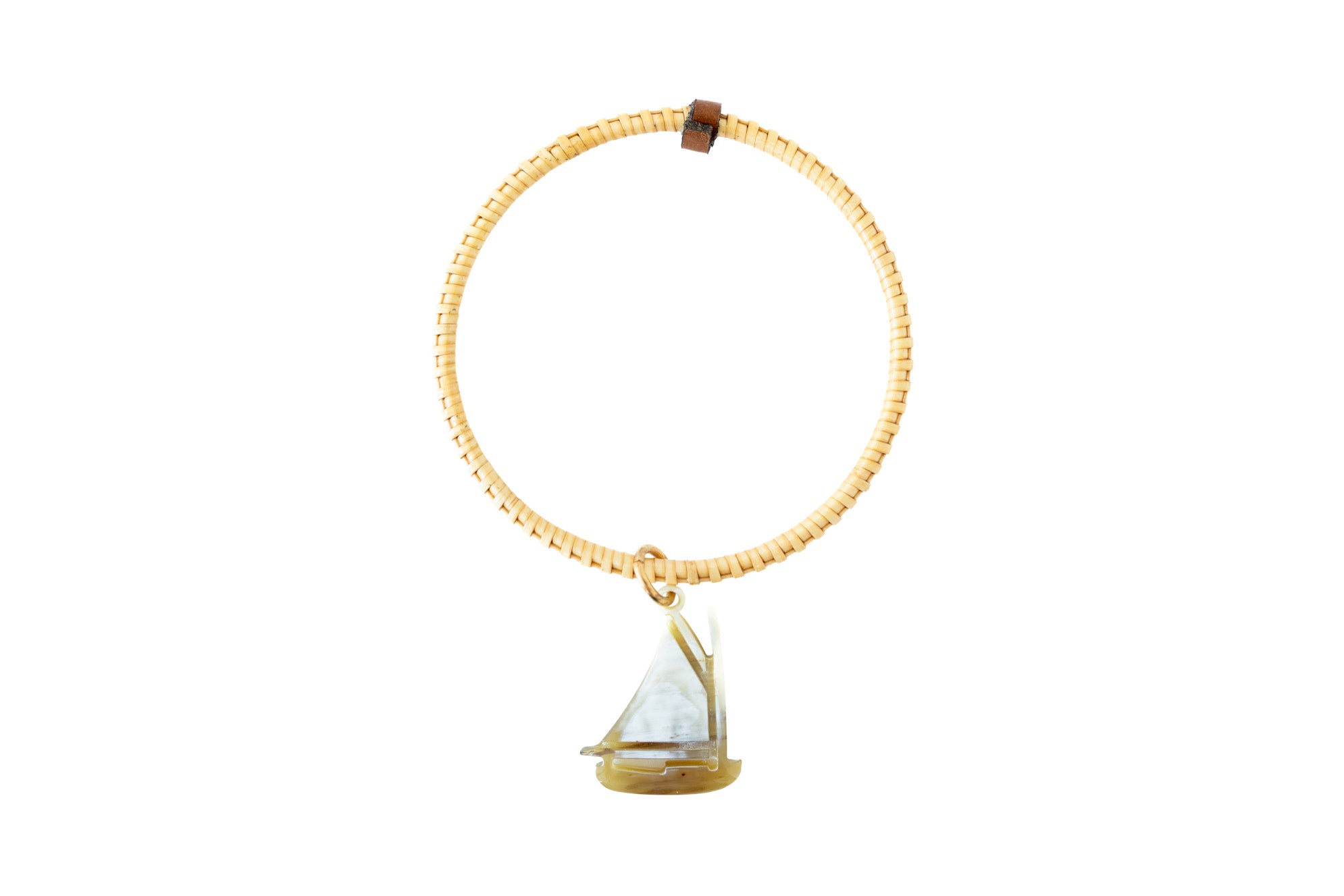 Handmade bangle with a sailboat charm.