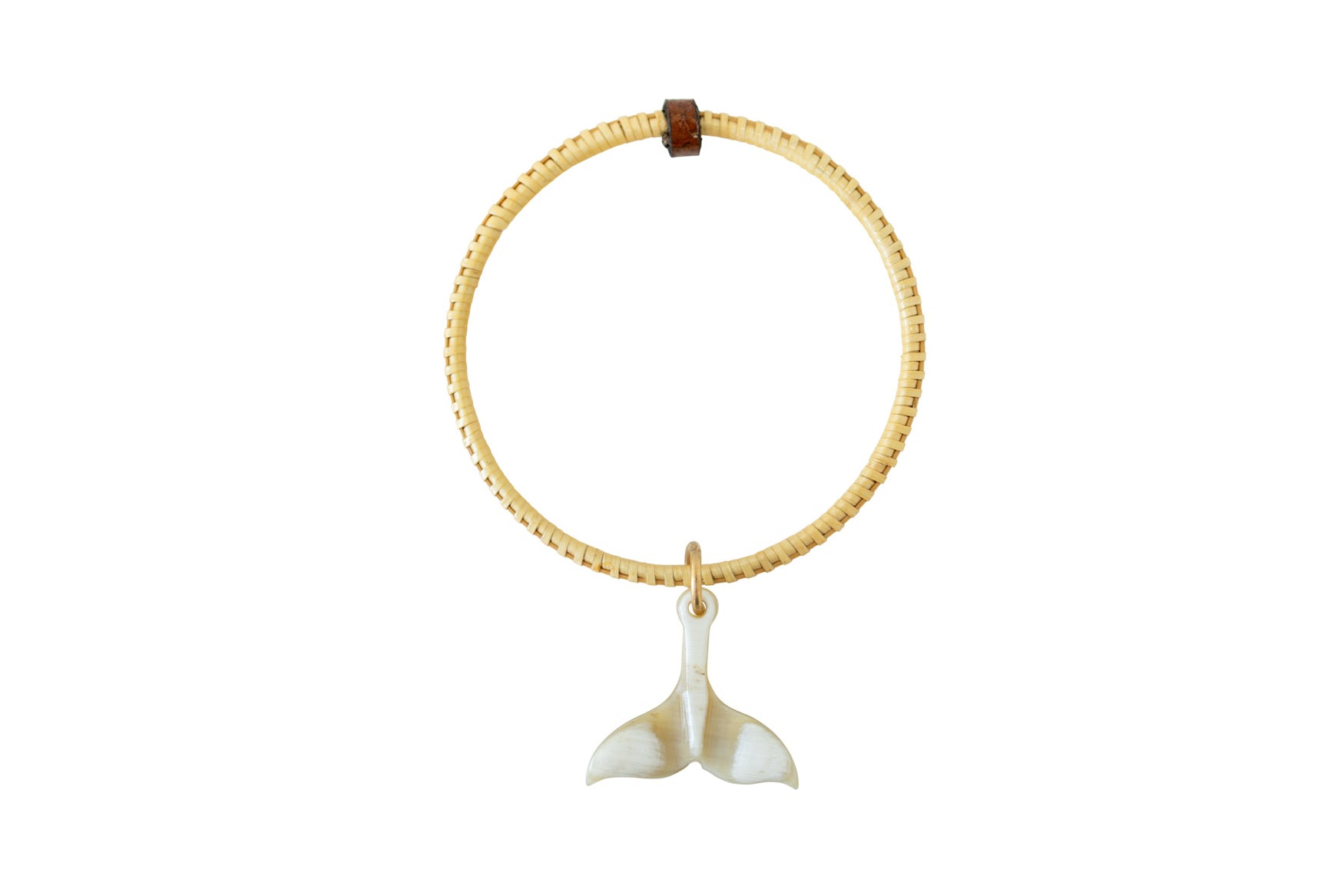 Bracelet with whale tail charm.
