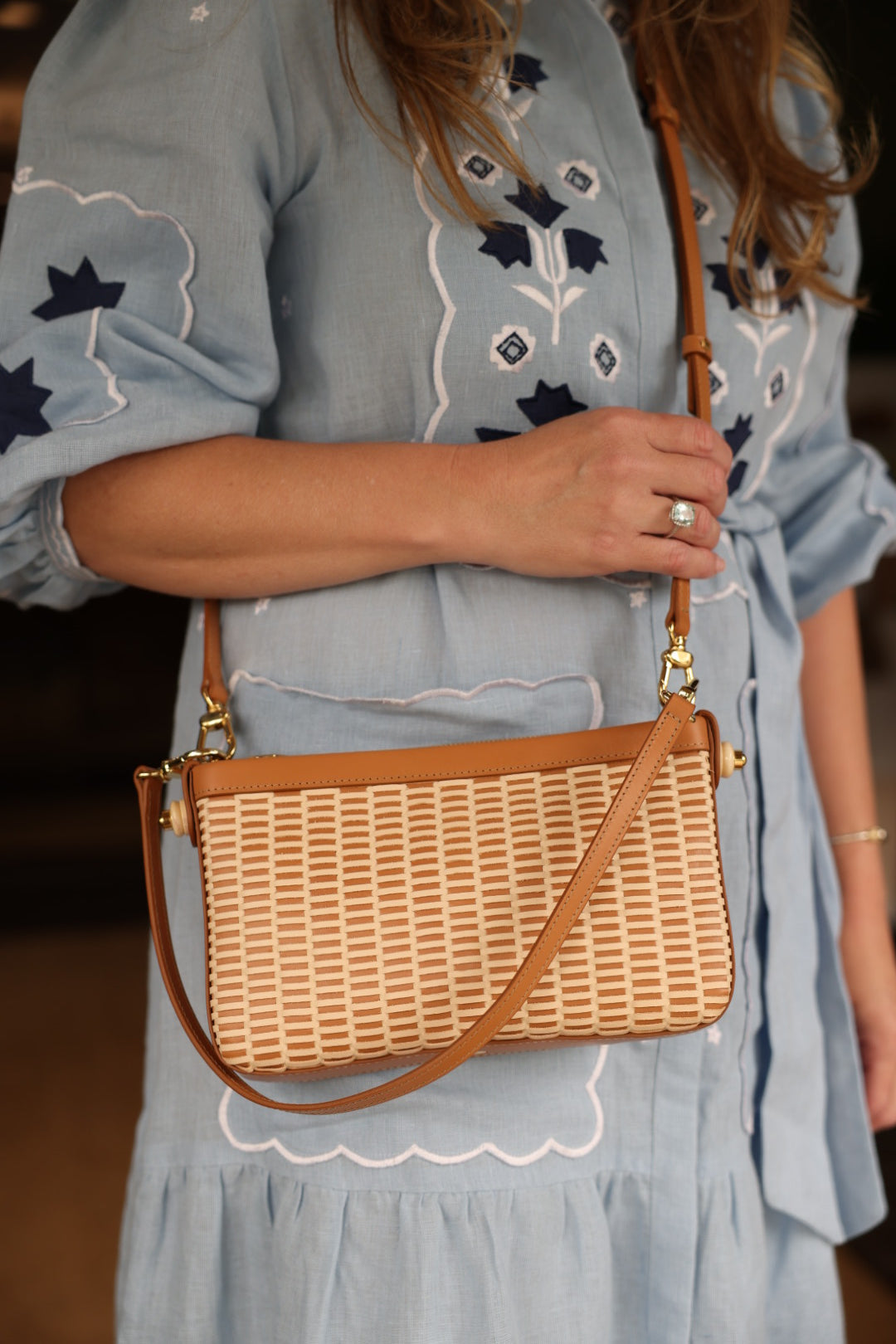 Whale Tail Weaving Leather Clutch On Model