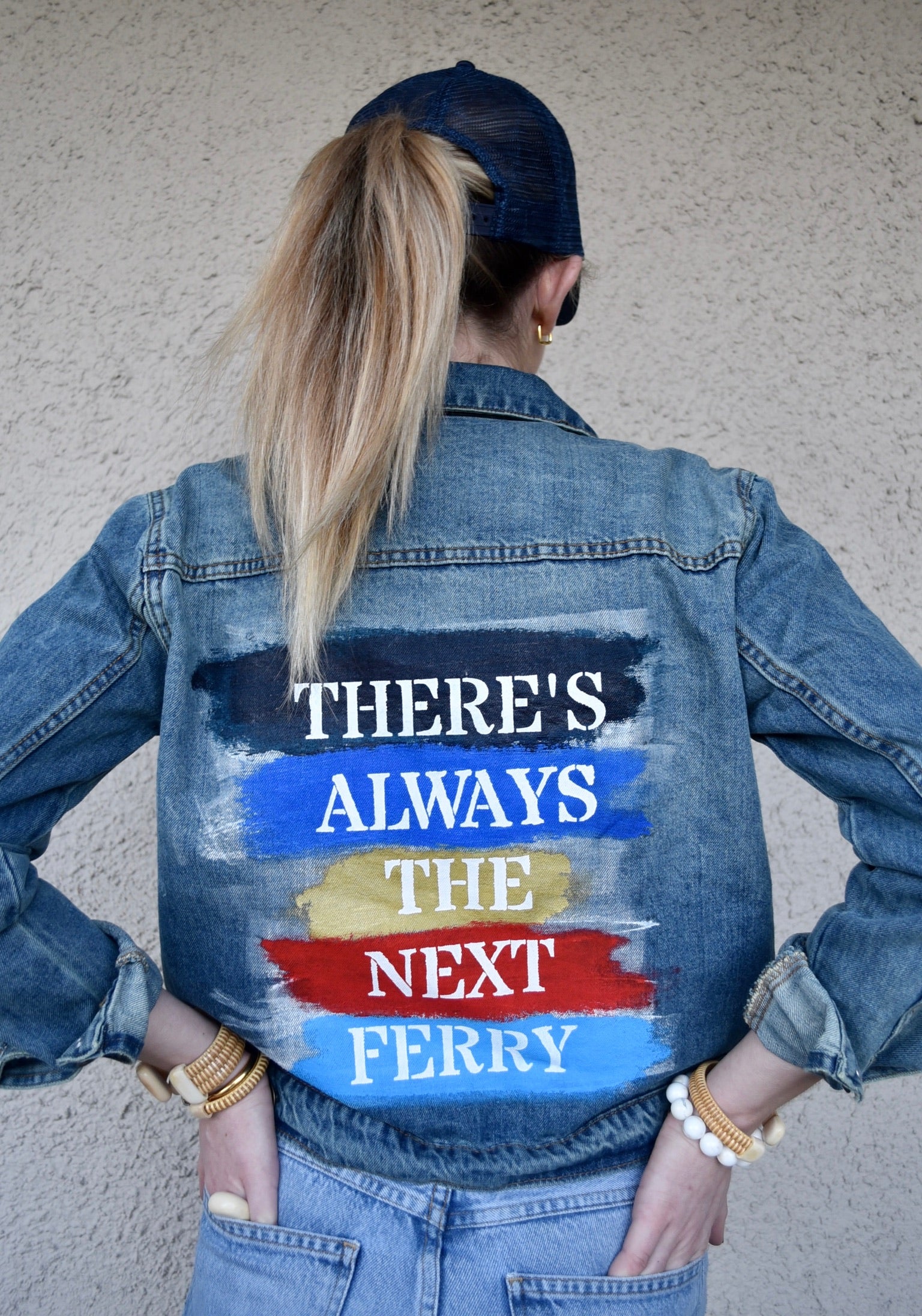 Jean jacket with the text: There's Always The Next Ferry