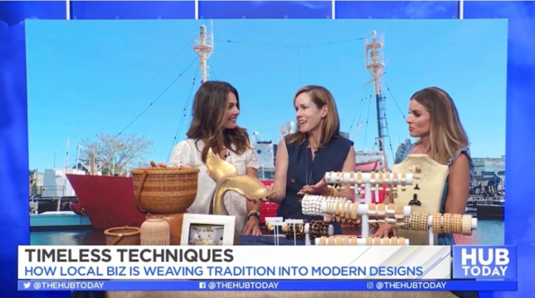 Whale Tail Weaving founders on the news, talking to a news anchor.