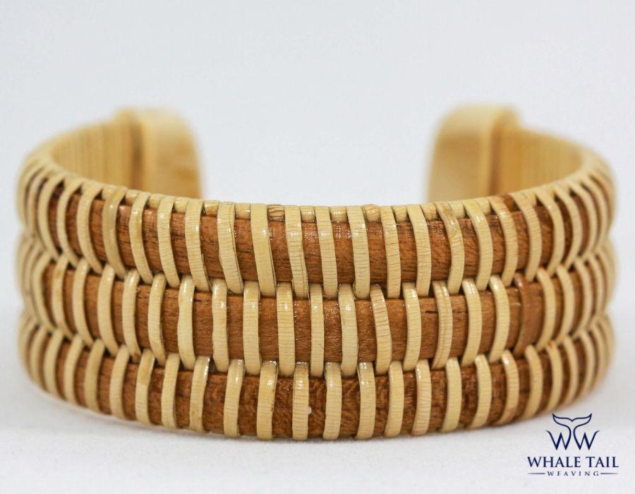 A handwoven triple stave nautical bracelet cuff.